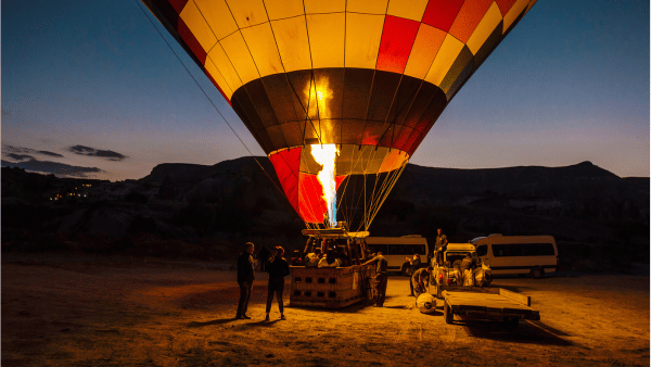Hot airballoon getting ready for sunrise flight.