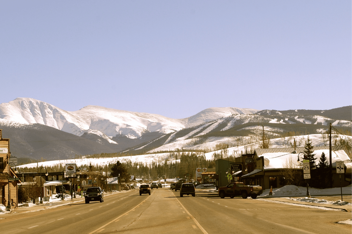 frasercolorado The downtown road of fraser colorado with mountains in background.