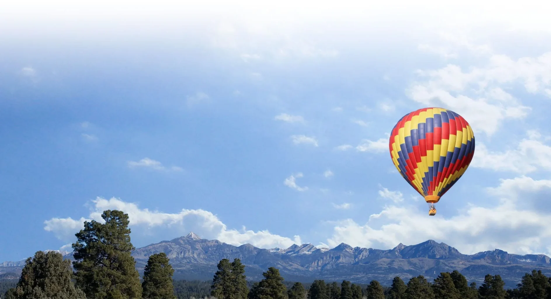 Best-places-to-go-hot-air-balloon Hot air balloon with the San Juan mountains in the background.