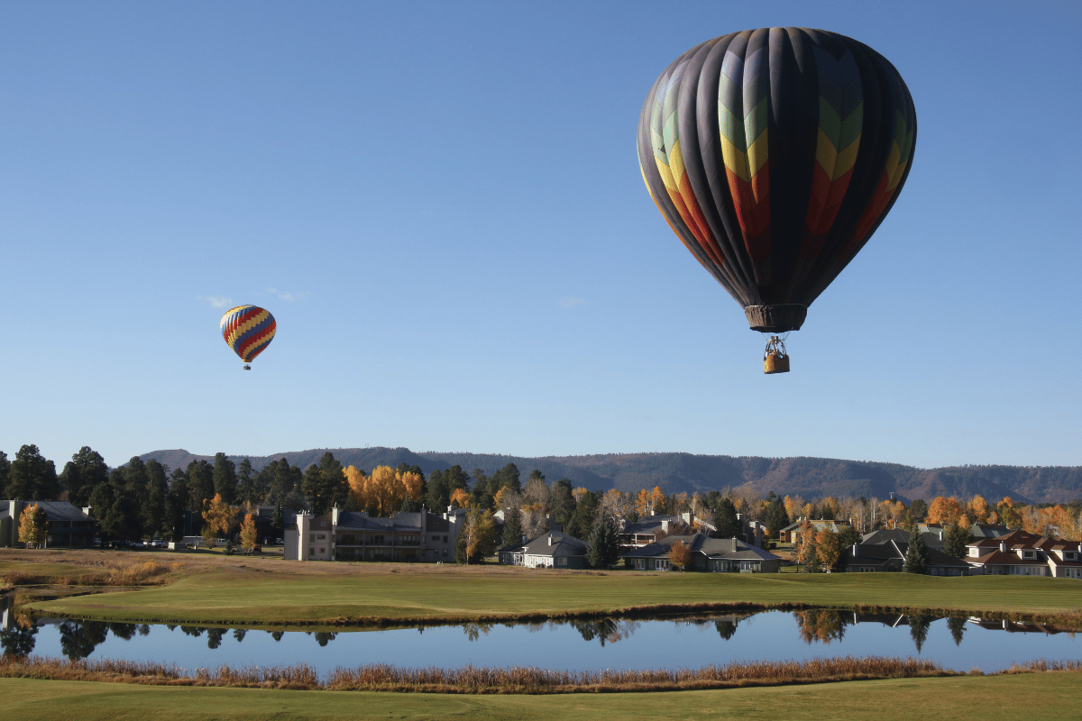 Two hot air balloons flying in pagosa springs.